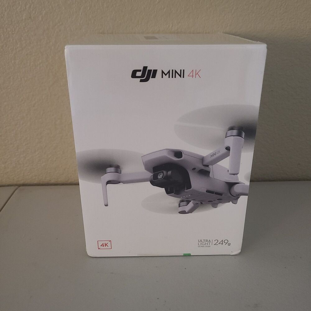 new in box DJI mini 4K drone lightweight photos videos vlogging